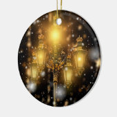 ランプにキラキラした雪が落ちる セラミックオーナメント (左)