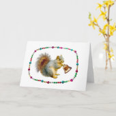 リスがベルを鳴らすクリスマスカード カード (黄色い花)
