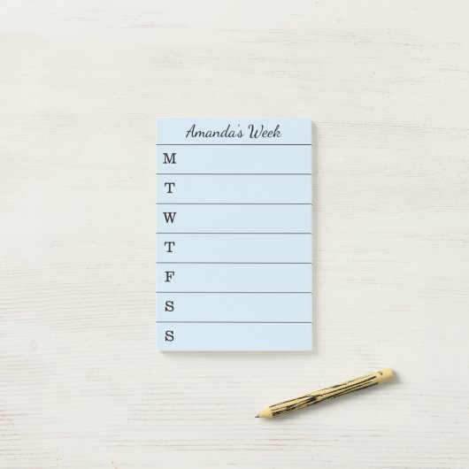 リストをする原稿の一流の淡いブルーのウィークリー ポストイット (デスク上)
