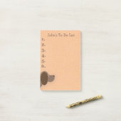 リストをパーソナライズされた表示する茶色の犬 ポストイット (デスク上)