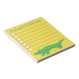 リストを実行する黄色の緑のワニのワニ掛け ノートパッド