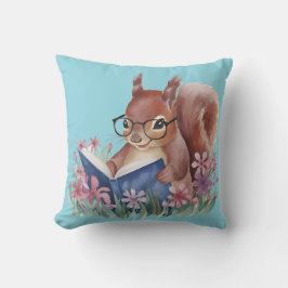 リス読ルの本が花で囲まれている クッション