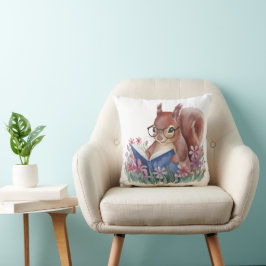 リス読ルの本が花で囲まれている クッション