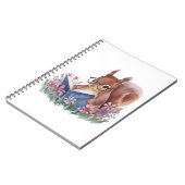 リス読ルの本が花で囲まれている ノートブック (左側)