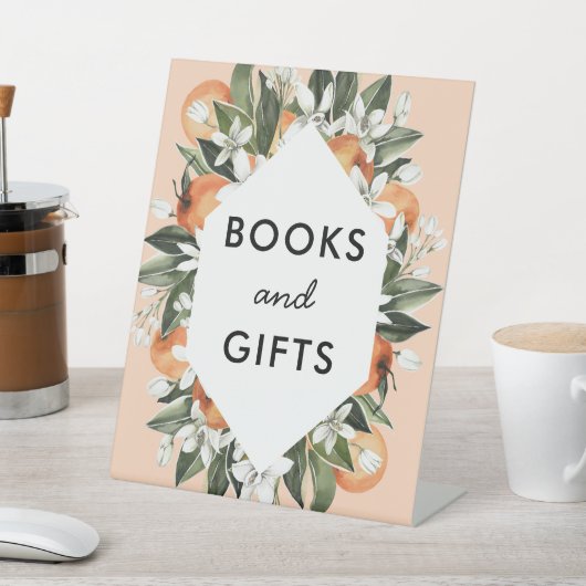 リトルかわいこちゃんをテーマにした赤ちゃんシャワーの本とプレゼント 台座サイン (インサイチュ)