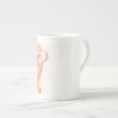 リボンの骨灰磁器のマグを抱き締めること ボーンチャイナマグカップ (正面右)