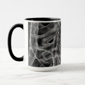 リボン状の曲線、ハイライト表示されたレリーフ、 浮き彫り マグカップ (左)