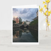 リュブリャナスロベニア川の夕暮れ反射の写真 カード (黄色い花)