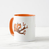 リラックスのオレンジと白の赤パンダ マグカップ (正面左)