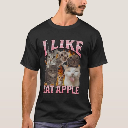 リンゴが好きで食べる面白い猫のミーム海賊版グラフィック Tシャツ (正面)
