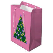 リンゴポップ・アートの&バナナピンクのアートクリスマスツリー ミディアムペーパーバッグ (裏面アングル)