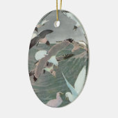 ルイス・アガシー・フエルテスによる海波上のサギ セラミックオーナメント (左)