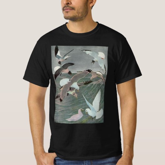 ルイ・アガシ・フエルテスによる海の波の上のカモメ Tシャツ (正面)