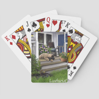 ルートビッヒカードを遊んでいるLeonbergerの子犬 トランプ