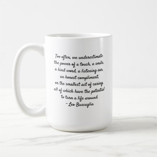 レオBUSCAGLIA著親切さのやる気を起こさせるな引用文 コーヒーマグカップ (左)