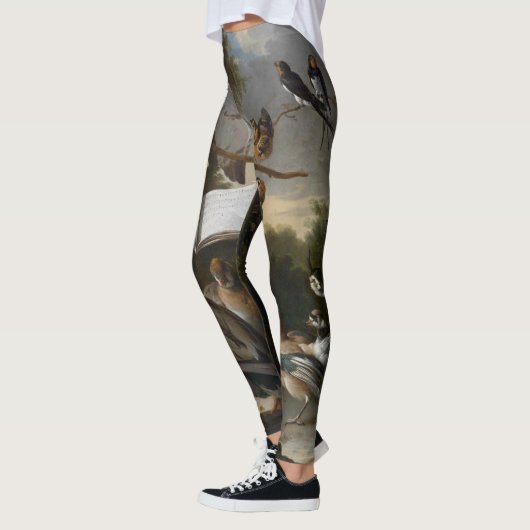 レギングを絵を描いている音楽的な鳥の群 レギンス (左)