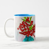 レッドクリスマスベリーの水の色のアー素晴らしト ツートーンマグカップ (左)