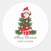 レッドサンタハットのクリスマスで可愛いパーソナライズされた猫 ラウンドシール (正面)