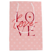 レッドタイポグラフィバレンタインデラブピンクハート ミディアムペーパーバッグ (正面)