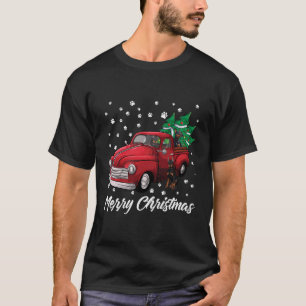 レッドトラックメリークリスマスツリードーバーマンクリスマス Tシャツ