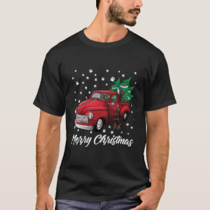 レッドトラックメリークリスマスツリードーバーマンクリスマス Tシャツ
