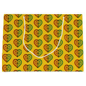 レッドブラックグリーンハートイエロークワンザ ラージペーパーバッグ (正面)