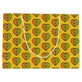 レッドブラックグリーンハートイエロークワンザ ラージペーパーバッグ (裏面)