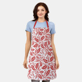 レッドホリデーホリーベリーパターン エプロン (着用した状態)