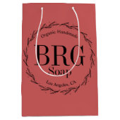 レッドボタニカルリースモノグラム小売店舗 ミディアムペーパーバッグ (正面)
