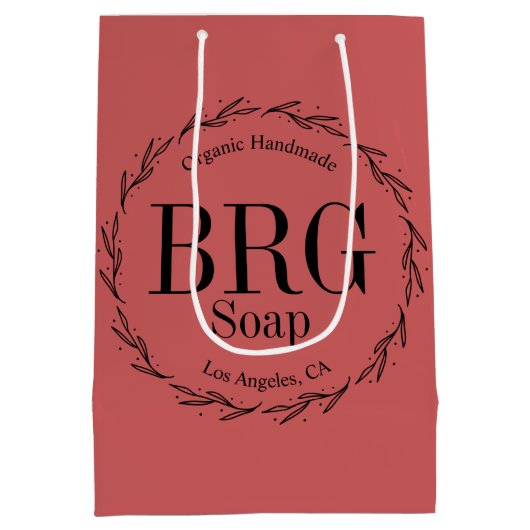 レッドボタニカルリースモノグラム小売店舗 ミディアムペーパーバッグ (裏面)