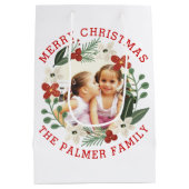 レッドメリークリスマス、花の果実の休日の写真 ミディアムペーパーバッグ (裏面)