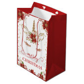 レッド&金ゴールドポインセチア顔メリークリスマス ミディアムペーパーバッグ (正面アングル)