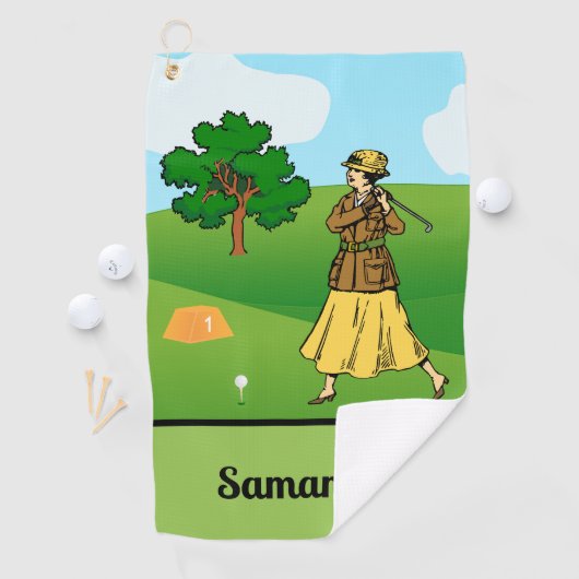 レディーゴルファーがティーオフの準備をする ゴルフタオル (インサイチュ)