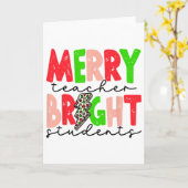 レトロで陽気な先生と明るい生徒たちの楽しいクリスマス カード (黄色い花)