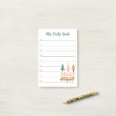 レトロなクリスマス私の毎日のゴールプランナーが並んだ ポストイット (デスク上)