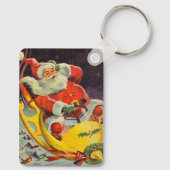 レトロなクリスマス、宇宙船のサンタクロース キーホルダー (裏面)