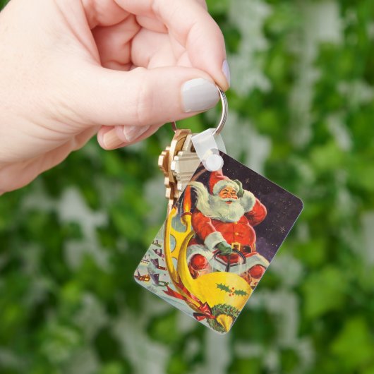 レトロなクリスマス、宇宙船のサンタクロース キーホルダー (手)
