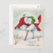 レトロなヴィンテージのキスをするクリスマスの雪のカップル シーズンポストカード (正面/裏面)