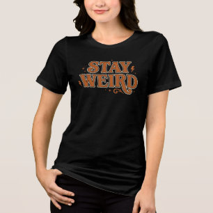 レトロな70年代のグルービーなタイポグラフィーが特徴の「Stay Weird」デザイン トライブレンドTシャツ