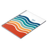 レトロのストライプ波状のパターンとモノグラム ノートブック (左側)