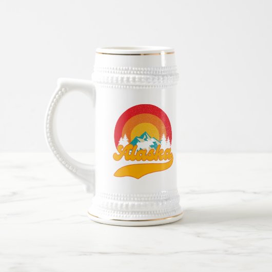 レトロサンセットアラスカジュヌームース0マウンテンズワイルド ビールジョッキ (左)