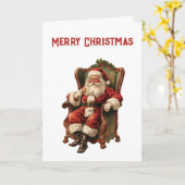 レトロサンタクロースが椅子に座るクリスマス カード (黄色い花)
