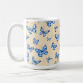 レトロチノイスリーブルー蝶赤面アイボリー コーヒーマグカップ (左)