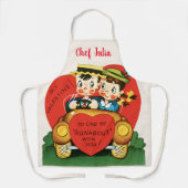 レトロバレンタインデー、ヴィンテージガールと少年の車 エプロン (正面)