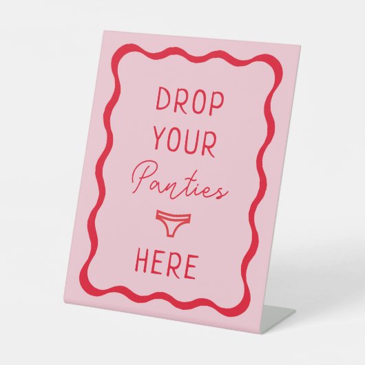 レトロピンクの波打ちパンティーここにゲームサイン 台座サイン (正面)