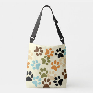 レトロ色の犬のpawprint クロスボディバッグ