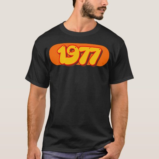 レトロ1977 70年代スタイルのポップアートイヤー Tシャツ (正面)
