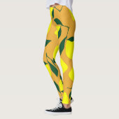 レモシンプルン柄、オレンジ色の背景。 レギンス (左)