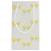 レモンの薄切りを落とす黄色 スモールペーパーバッグ (正面)