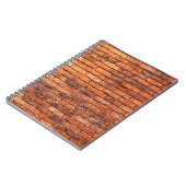 レンガ壁の赤い構造の組積造 ノートブック (左側)